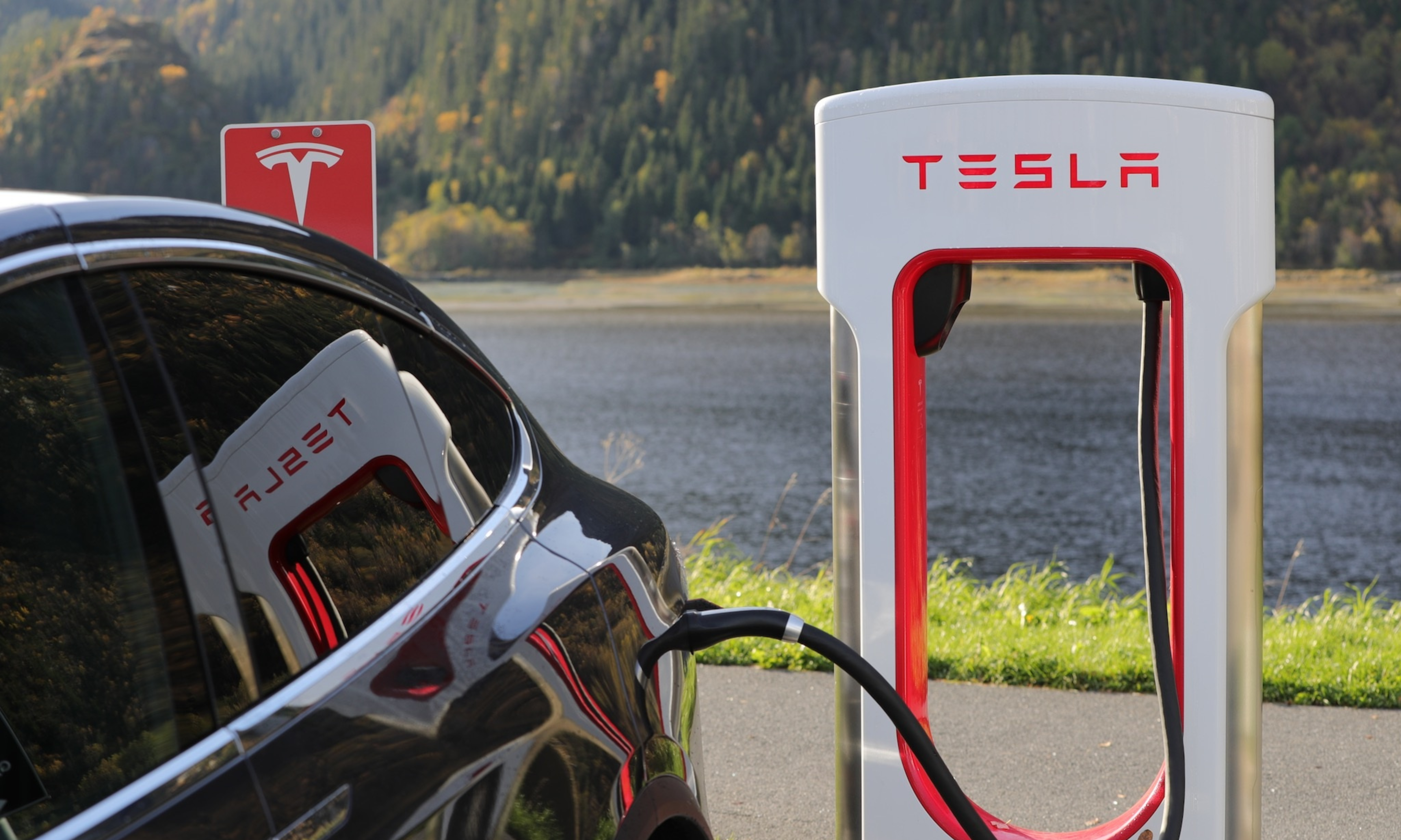 Charging on the Tesla Supercharging network with an adapter