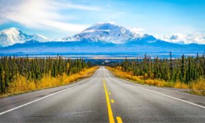 road with mountain in background