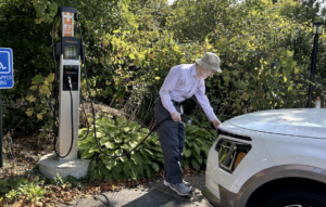 Man Charging EV